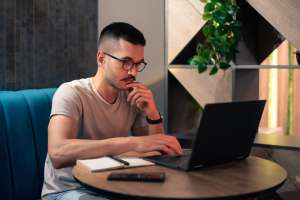 Young man working on a laptop