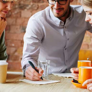 Meeting of Entrepreneurs Brainstorming on a Napkin