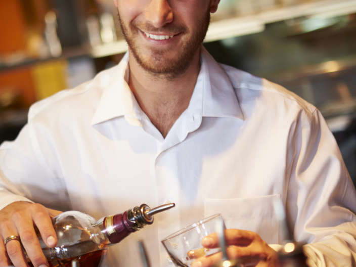 Barman Serving Drinks